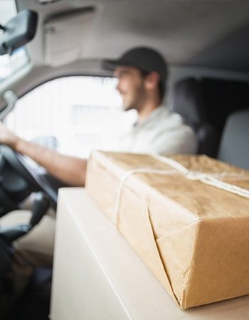 A parcel in a delivery vehicle